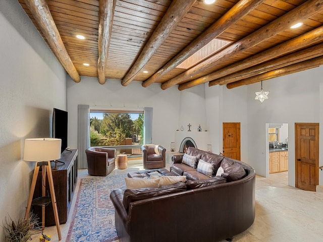 living area featuring wood ceiling, a towering ceiling, beam ceiling, and recessed lighting