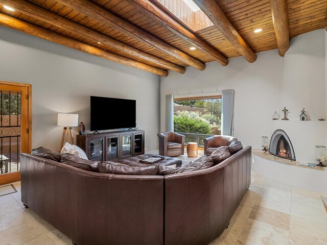 living area featuring a fireplace, wooden ceiling, recessed lighting, and beamed ceiling