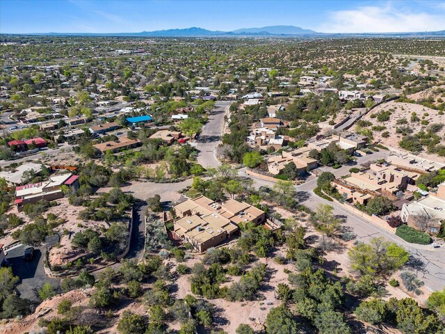 birds eye view of property featuring a residential view and a mountain view