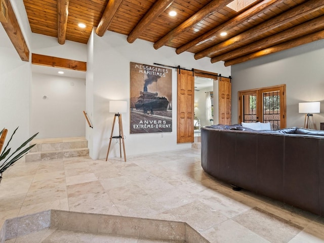 living room with beamed ceiling, wood ceiling, recessed lighting, and a barn door
