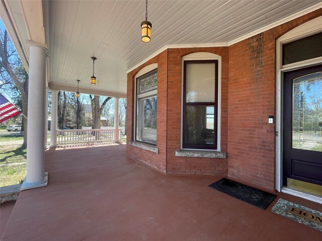 1607 8th St, Las Vegas, NM 87701 - view of patio / terrace featuring covered porch