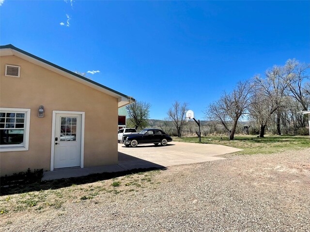1607 8th St, Las Vegas, NM 87701 - exterior space with stucco siding