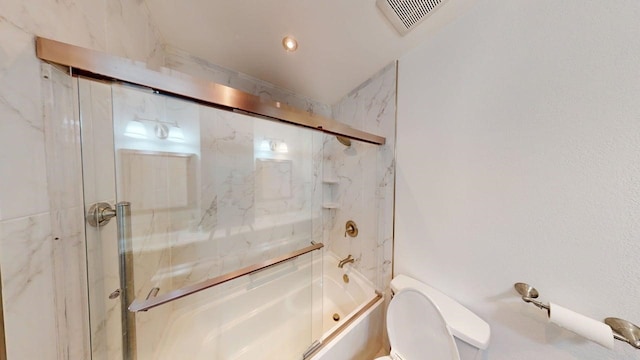 full bath with enclosed tub / shower combo, toilet, and visible vents