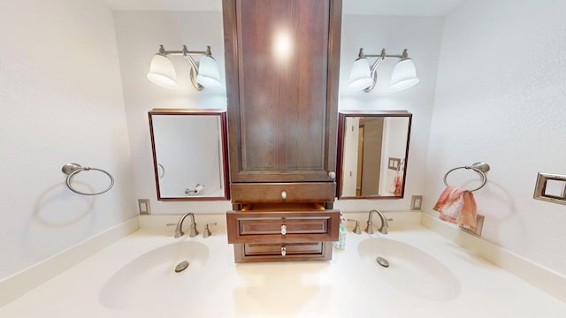 bathroom with double vanity