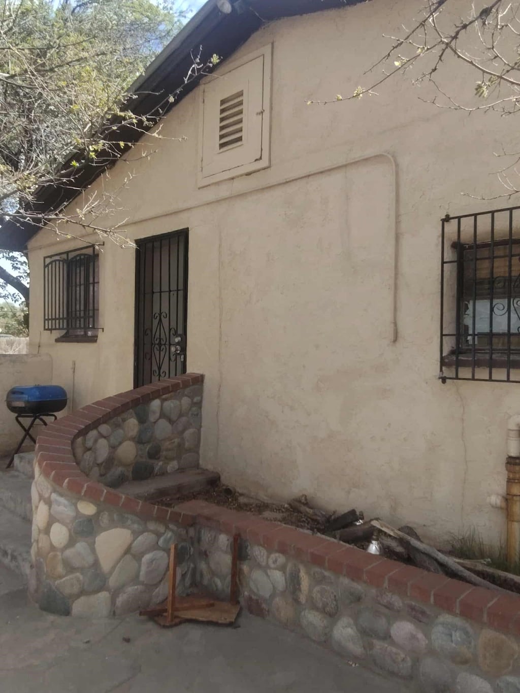 view of side of home featuring stucco siding