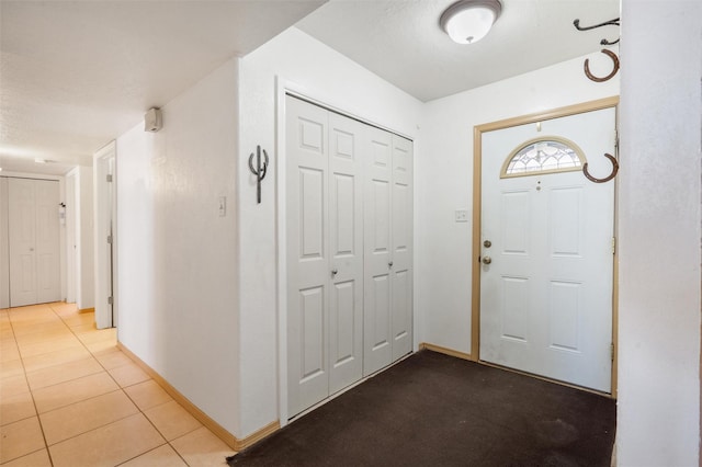 2416 Avenida De Las Campanas, Santa Fe, NM 87507 - tiled foyer entrance featuring baseboards