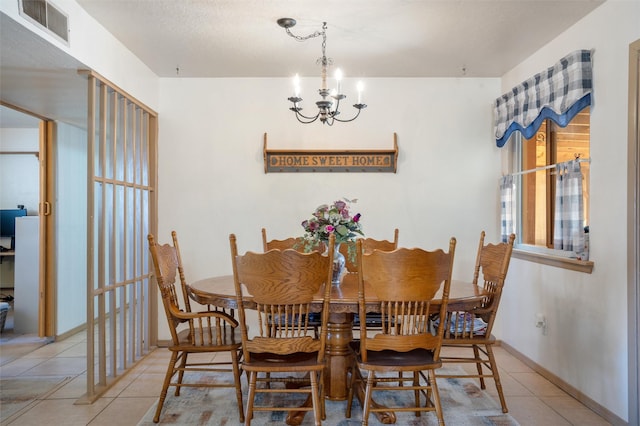 2416 Avenida De Las Campanas, Santa Fe, NM 87507 - tiled dining area with a chandelier