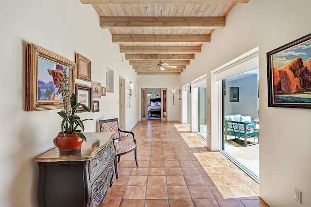 corridor featuring light tile patterned floors, beamed ceiling, and wood ceiling