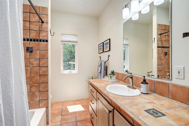 full bathroom with shower / bath combination with curtain, tile patterned flooring, and vanity