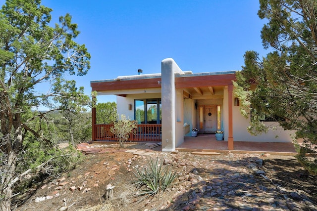 view of front of home featuring stucco siding
