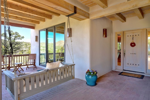 doorway to property with stucco siding