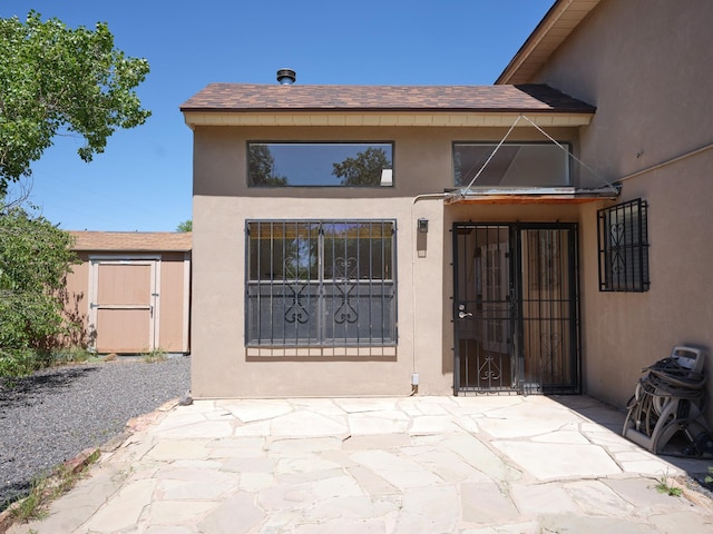 1094 Sunshine, Santa Fe, NM 87507 - kitchen featuring white appliances, white cabinets, and under cabinet range hood
