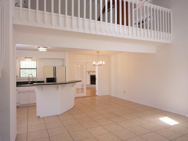 1094 Sunshine, Santa Fe, NM 87507 - details featuring baseboard heating, wooden ceiling, wood finished floors, and baseboards