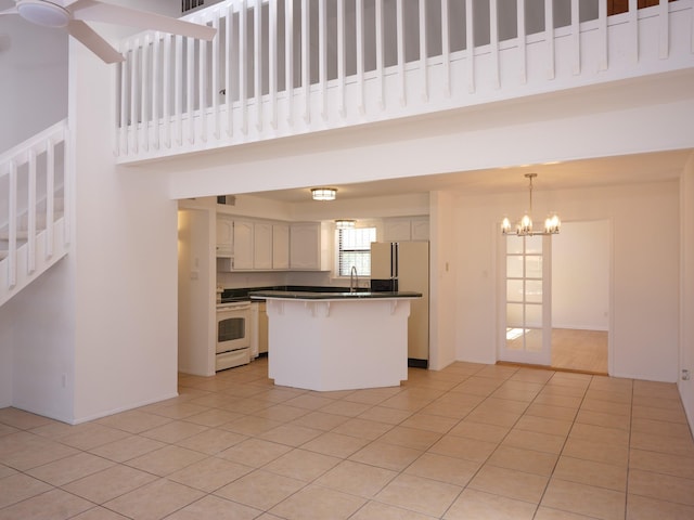 1094 Sunshine, Santa Fe, NM 87507 - spare room with a textured ceiling, carpet flooring, and baseboards