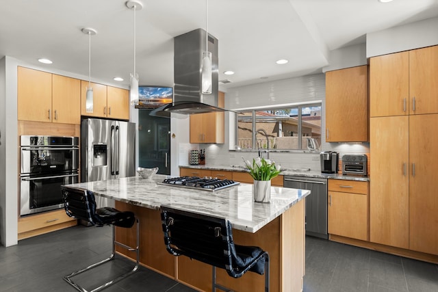 kitchen with appliances with stainless steel finishes, island exhaust hood, a breakfast bar area, and backsplash