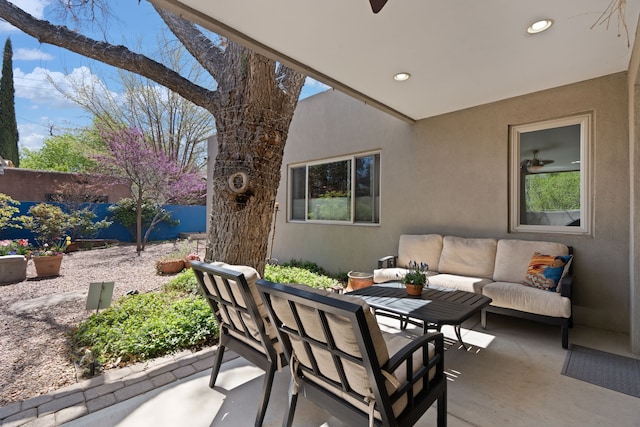 view of patio with outdoor lounge area and a fenced backyard