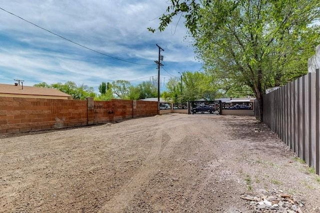 view of street featuring dirt driveway
