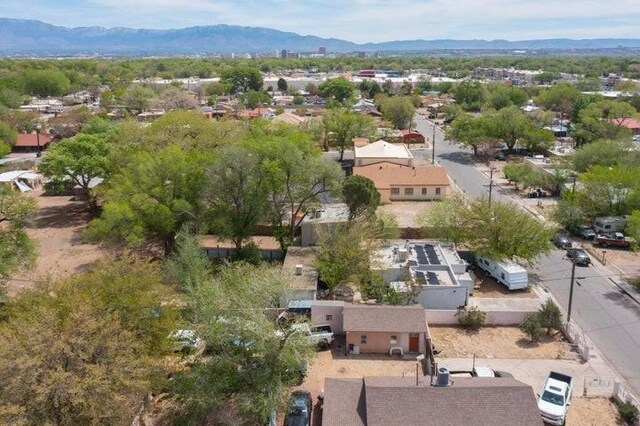 drone / aerial view featuring a mountain view and a residential view