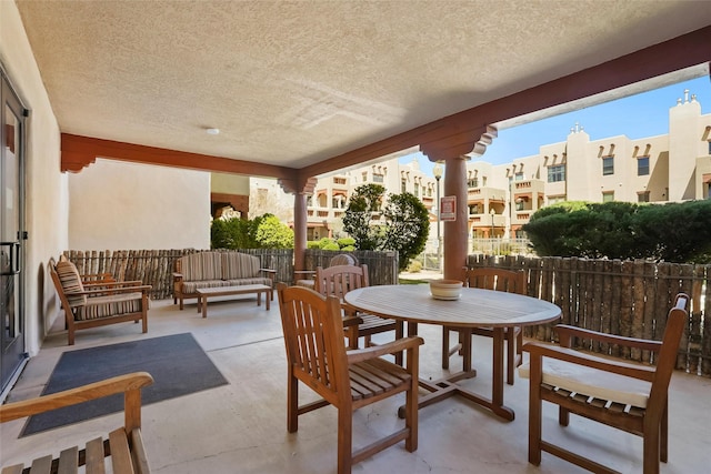 1405 Vegas Verdes Unit 341, Santa Fe, NM 87507 - view of patio / terrace featuring a balcony and outdoor lounge area