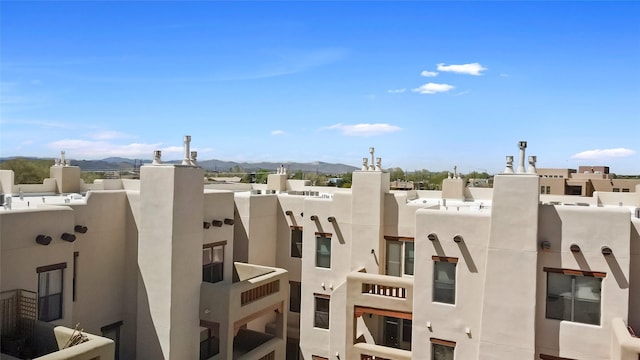 1405 Vegas Verdes Unit 341, Santa Fe, NM 87507 - view of property featuring a mountain view