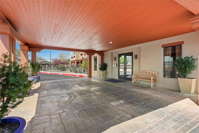 1405 Vegas Verdes Unit 341, Santa Fe, NM 87507 - view of patio featuring french doors and fence