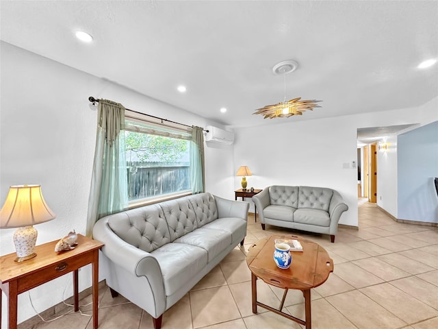 living area featuring light tile patterned floors, baseboards, a wall mounted AC, and recessed lighting