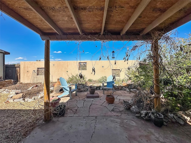 view of patio with fence