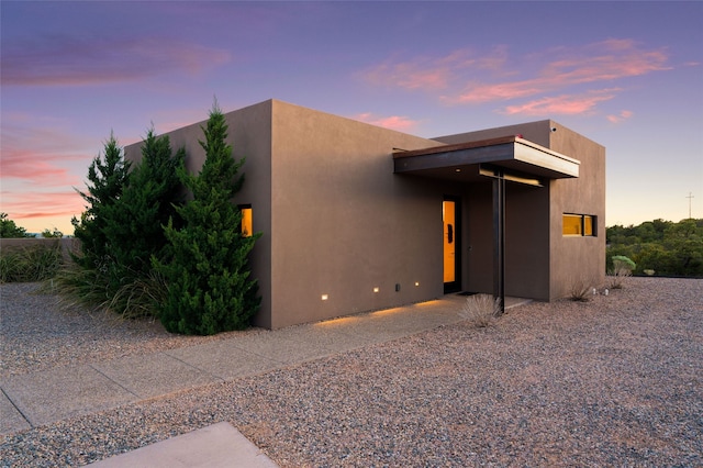 view of front facade with stucco siding