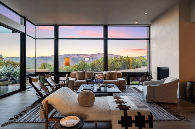 sunroom with a mountain view