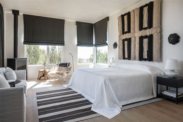 bedroom with wood finished floors