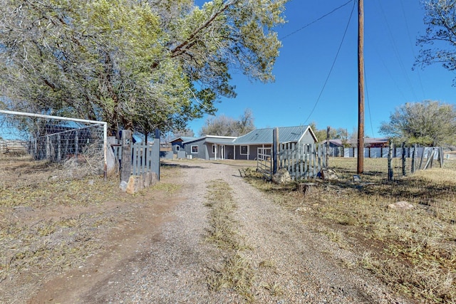 54 County Road B40A, Ribera, NM 87560 - view of dirt / gravel road with a gated entry