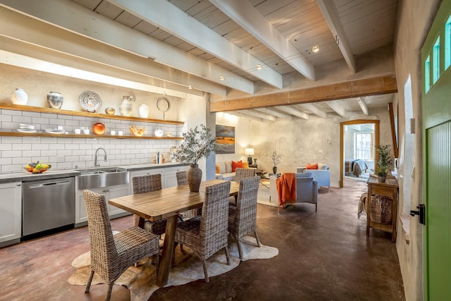534 Hillside Ave, Santa Fe, NM 87501 - dining space with wood ceiling, concrete flooring, and beam ceiling