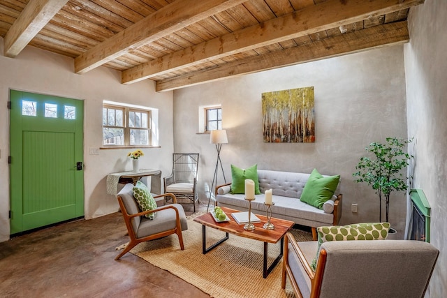 534 Hillside Ave, Santa Fe, NM 87501 - sitting room featuring finished concrete floors, wooden ceiling, and beamed ceiling