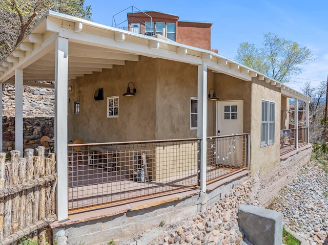534 Hillside Ave, Santa Fe, NM 87501 - property entrance with fence and stucco siding