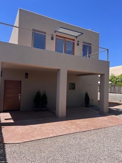 view of front of house featuring stucco siding