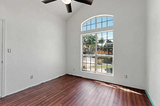 8228 Fairmont Dr NW, Albuquerque, NM 87120 - unfurnished room featuring a ceiling fan, lofted ceiling, and dark wood-style floors