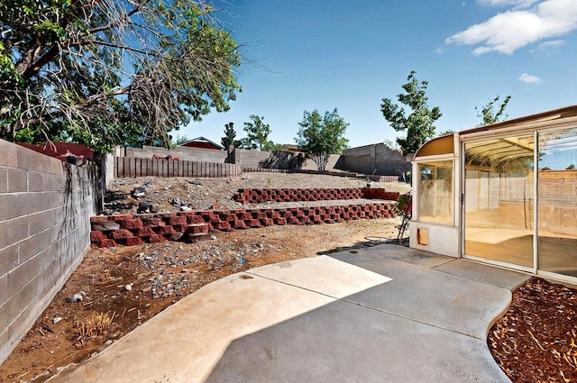 8228 Fairmont Dr NW, Albuquerque, NM 87120 - view of patio / terrace with a fenced backyard