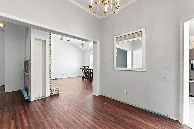 8228 Fairmont Dr NW, Albuquerque, NM 87120 - interior space featuring an inviting chandelier, ornamental molding, and wood finished floors