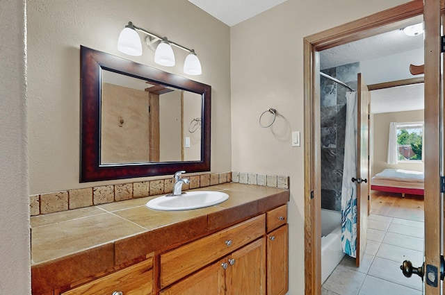 full bathroom with vanity, tile patterned floors, and shower / bath combination with curtain