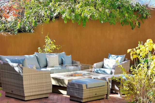 511 Armijo Unit C, Santa Fe, NM 87501 - view of patio with an outdoor living space with a fire pit