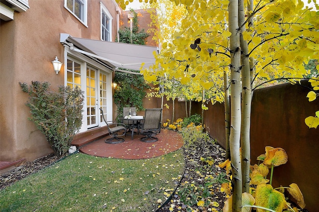 511 Armijo Unit C, Santa Fe, NM 87501 - view of yard with fence, french doors, and a patio area