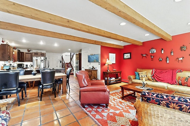 living room featuring recessed lighting, light tile patterned floors, beam ceiling, and stairway