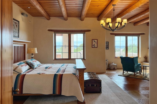bedroom featuring wooden ceiling, beam ceiling, and a chandelier