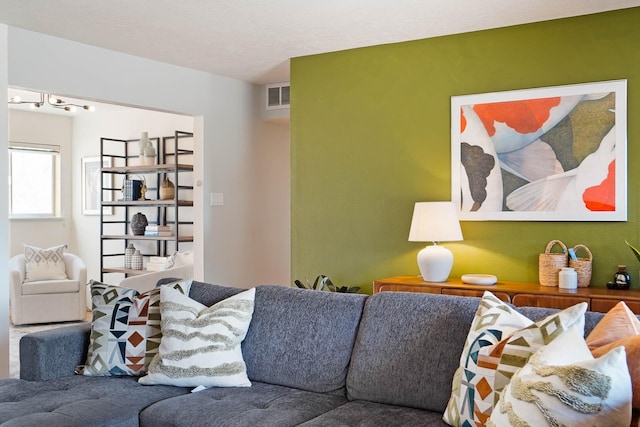 living area featuring visible vents