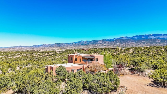 bird's eye view with a mountain view
