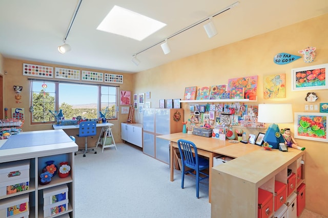 office area featuring track lighting