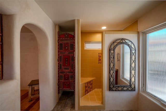 246 Maynard St, Santa Fe, NM 87501 - interior space with wood finished floors and arched walkways