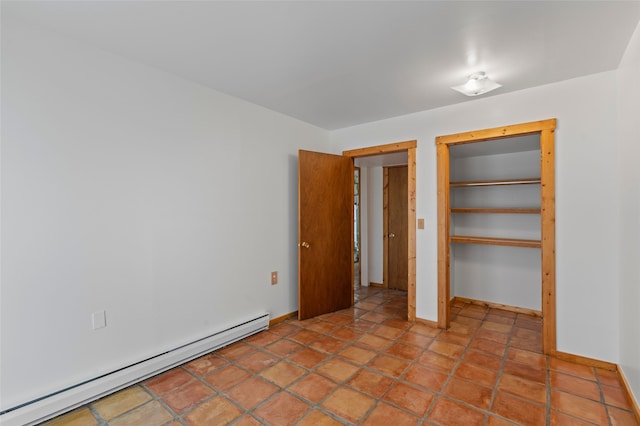 1 Jornada Loop, Santa Fe, NM 87508 - unfurnished bedroom with a baseboard radiator and baseboards