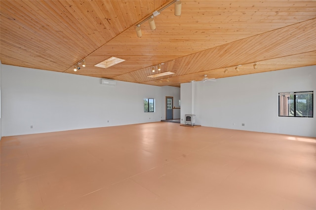 1 Jornada Loop, Santa Fe, NM 87508 - spare room featuring rail lighting and wooden ceiling