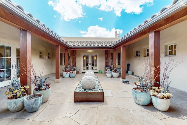 view of patio / terrace featuring french doors